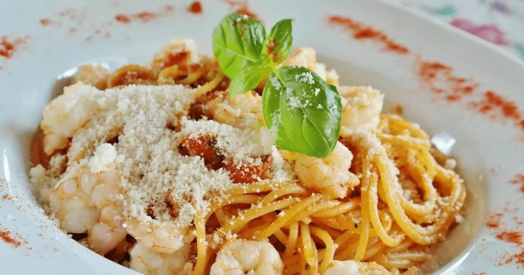 Plate of Barilla Protein Pasta with fresh vegetables and sauce, showcasing a healthy, protein-packed meal option