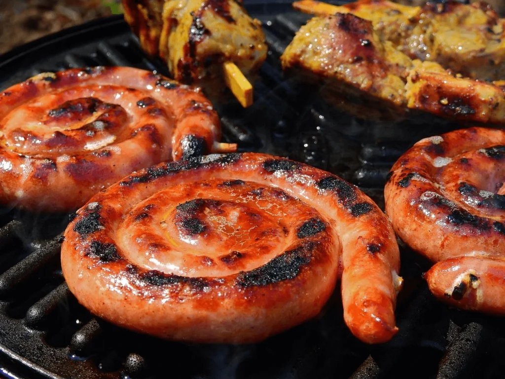 A collage of 10 delicious beef sausage dishes, including casseroles, pasta, stuffed peppers, and appetizers, showcasing a variety of flavorful meal ideas.