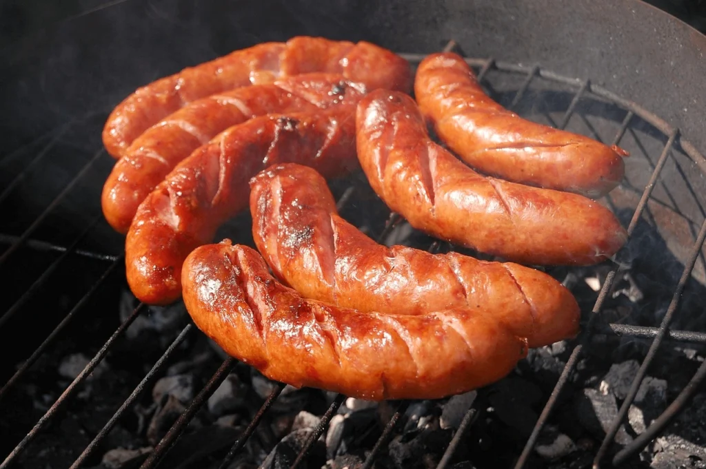 A collage of 10 delicious beef sausage dishes, including casseroles, pasta, stuffed peppers, and appetizers, showcasing a variety of flavorful meal ideas.