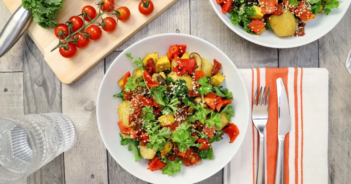 Lobster pasta for Ramadan served in a white plate with creamy sauce and parsley garnish