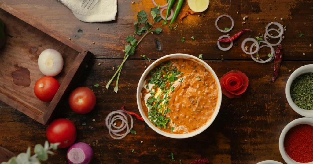Garnishing Lobster Bisque with Fresh Herbs
