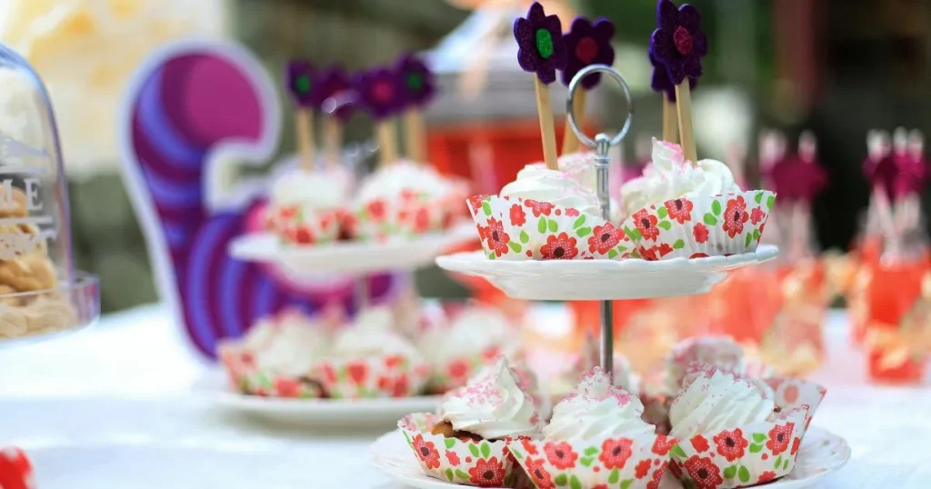 Filling mini tart shells with creamy custard using piping bag for mini desserts recipe