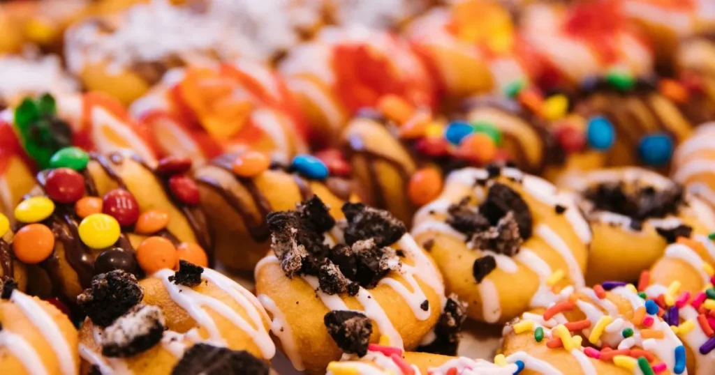 Mini egg cookie dough with chocolate mini eggs mixed into the batter ready for baking