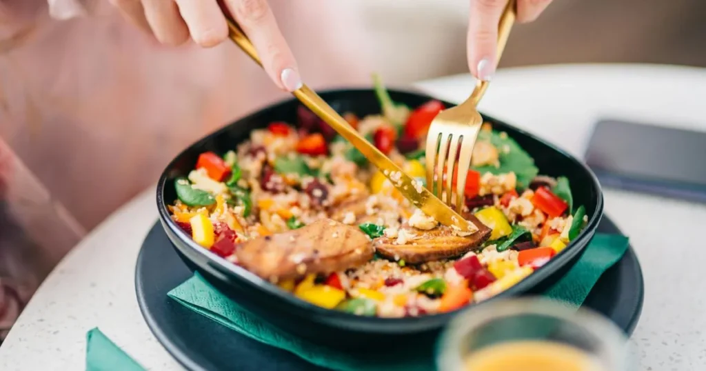 Garlic sautéed vegetables with green beans and mushrooms in a frying pan healthy side dish